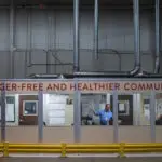 Warehouse staff coordinate incoming shipments at Mid-Ohio Food Collective’s headquarters. From inside this dock office, beneath the motto "A Hunger-Free and Healthier Community," they track the movement of pallets and cases of food. REUTERS/Evelyn Hockstein