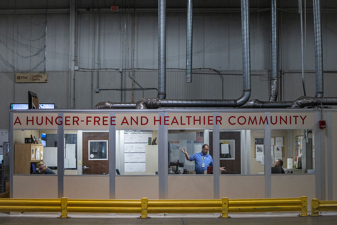 Warehouse staff coordinate incoming shipments at Mid-Ohio Food Collective’s headquarters. From inside this dock office, beneath the motto "A Hunger-Free and Healthier Community," they track the movement of pallets and cases of food. REUTERS/Evelyn Hockstein